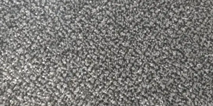 Close view of a soft grey Saxony carpet